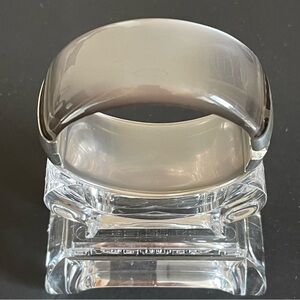 Vintage silver tone gray moonglow lucite clamper bangle.